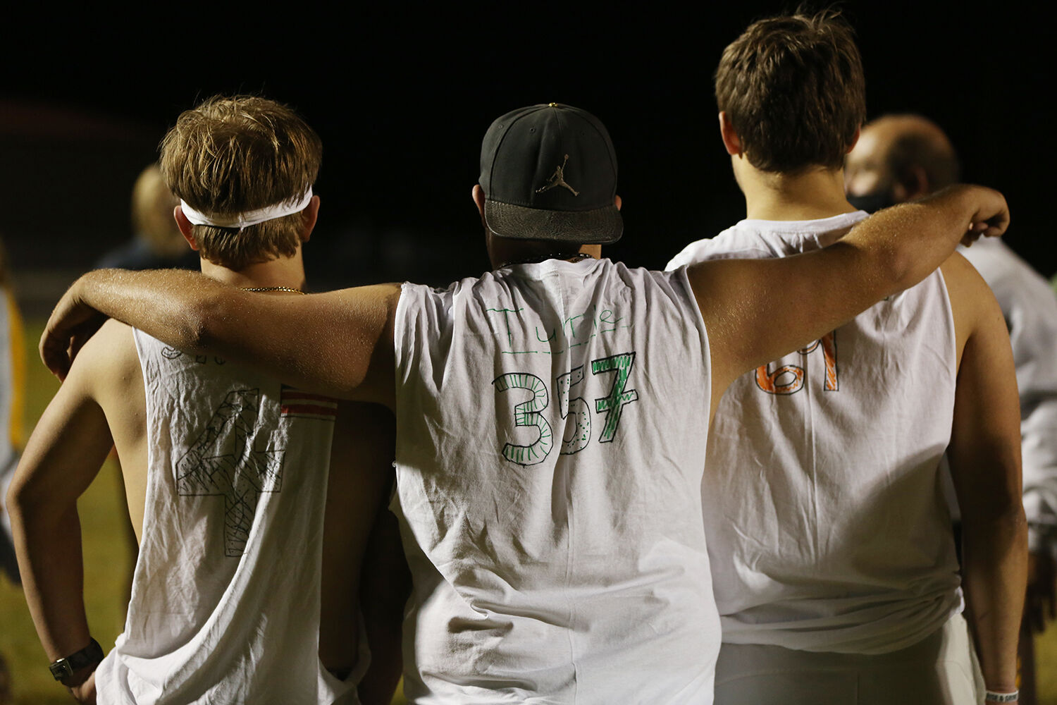 Sam Hulick, Matthew Harrison and Marko Glassock stand together